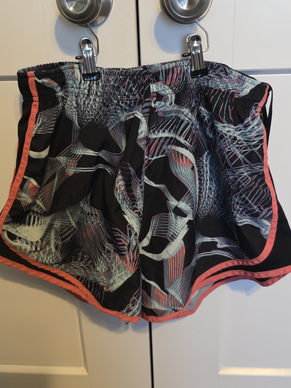 Nike Women’s Black Athletic Shorts with Coral and Mint Abstract Print